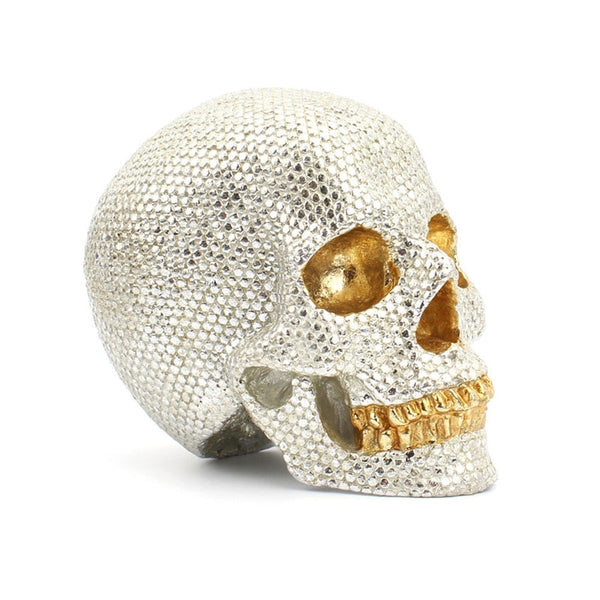 Reflective Golden Skull Sculpture