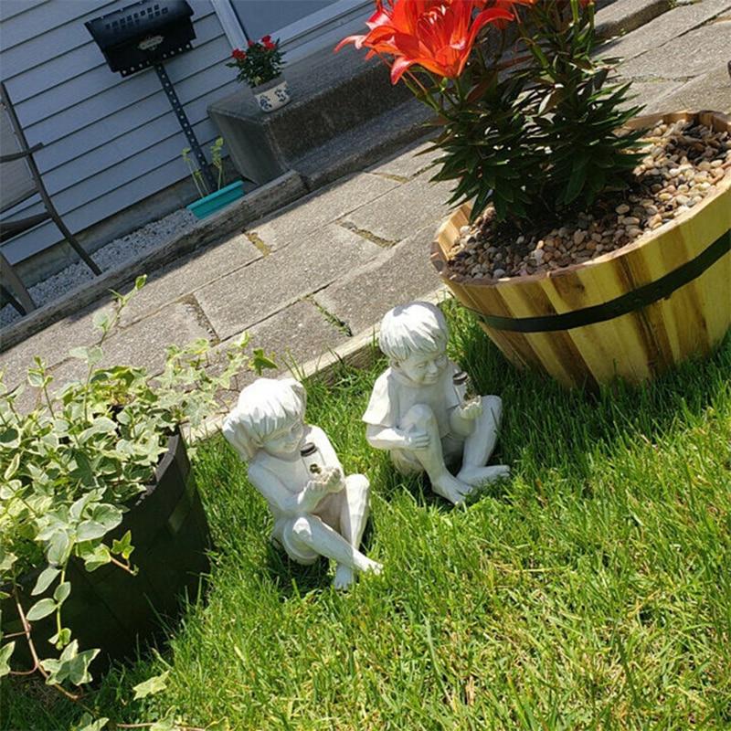 Ethan and Emma with Fireflies Garden Statue