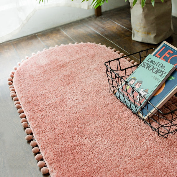 Pom-pom Trimmed Oval Anti-skid Rug