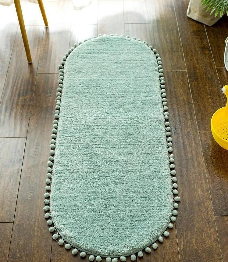 Pom-pom Trimmed Oval Anti-skid Rug