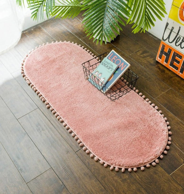 Pom-pom Trimmed Oval Anti-skid Rug