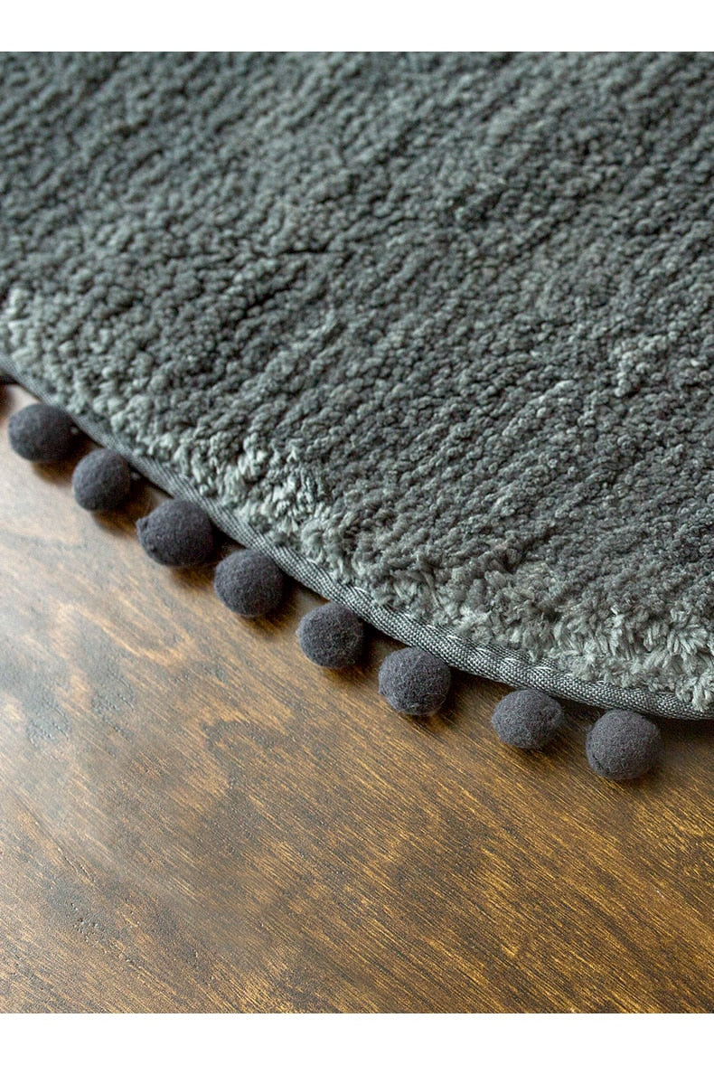 Pom-pom Trimmed Oval Anti-skid Rug